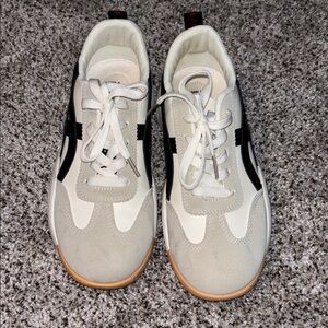 Stylish White and Black Sneakers worn twice. Excellent condition.